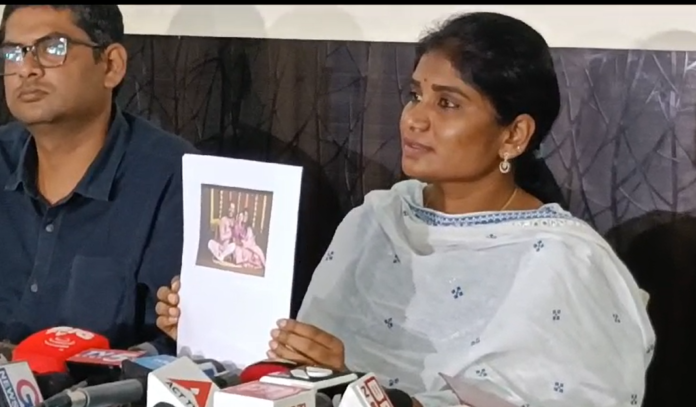 Being a tribal woman, she is being pulled on the road