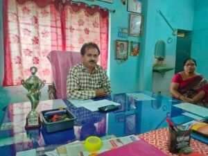 Vijaya Naik as Principal of Nadigudem College.