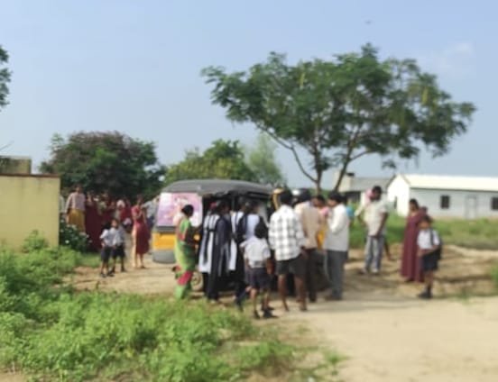 Auto overturned with students...students injured