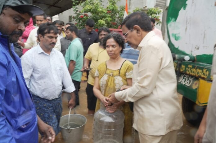 Ministers Narayana and Kondapalli Srinivas visited the flood affected areas Ministers Narayana and Kondapalli Srinivas visited the flood affected areas