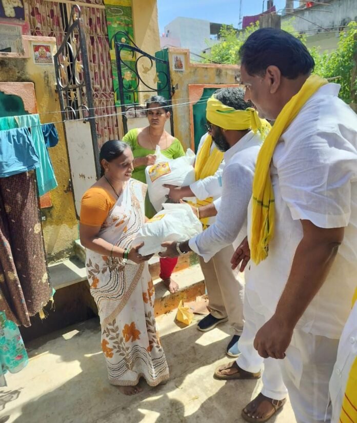 Pathikonda MLA KE Shyambabu distributed essential goods kits to the flood victims Pathikonda MLA KE Shyambabu distributed essential goods kits to the flood victims