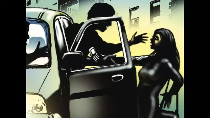 A girl was raped by three men in a moving car after threatening her with a gun A girl was raped by three men in a moving car after threatening her with a gun