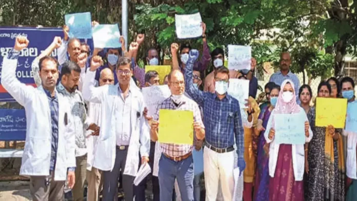 C. Belagal mandal doctors protest with black badges to cancel GO 85