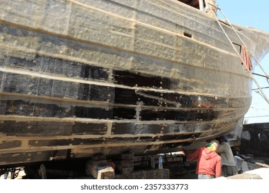 Hard work cutting boats