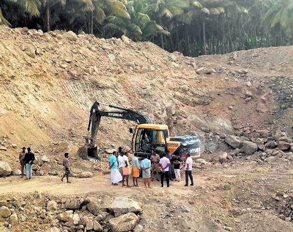 Mining officials inspected the site of the illegal earthworks Mining officials inspected the site of the illegal earthworks