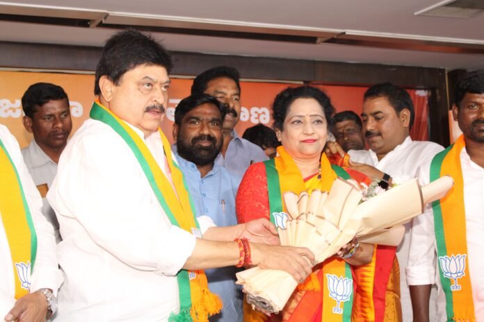 Actor Varun Sandesh's mother Dr. Ramani joins BJP