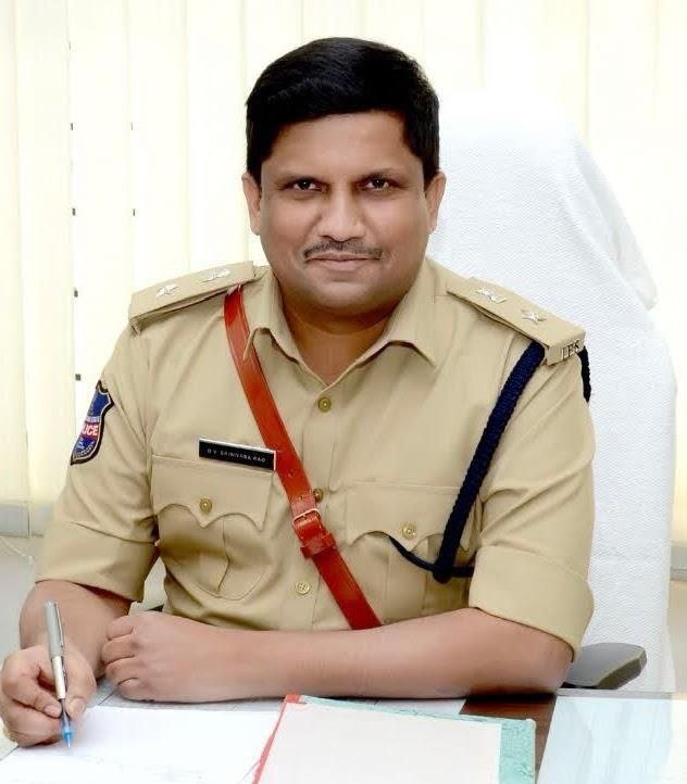 Distribution of bags to students under the leadership of SP D.V. Srinivasa Rao