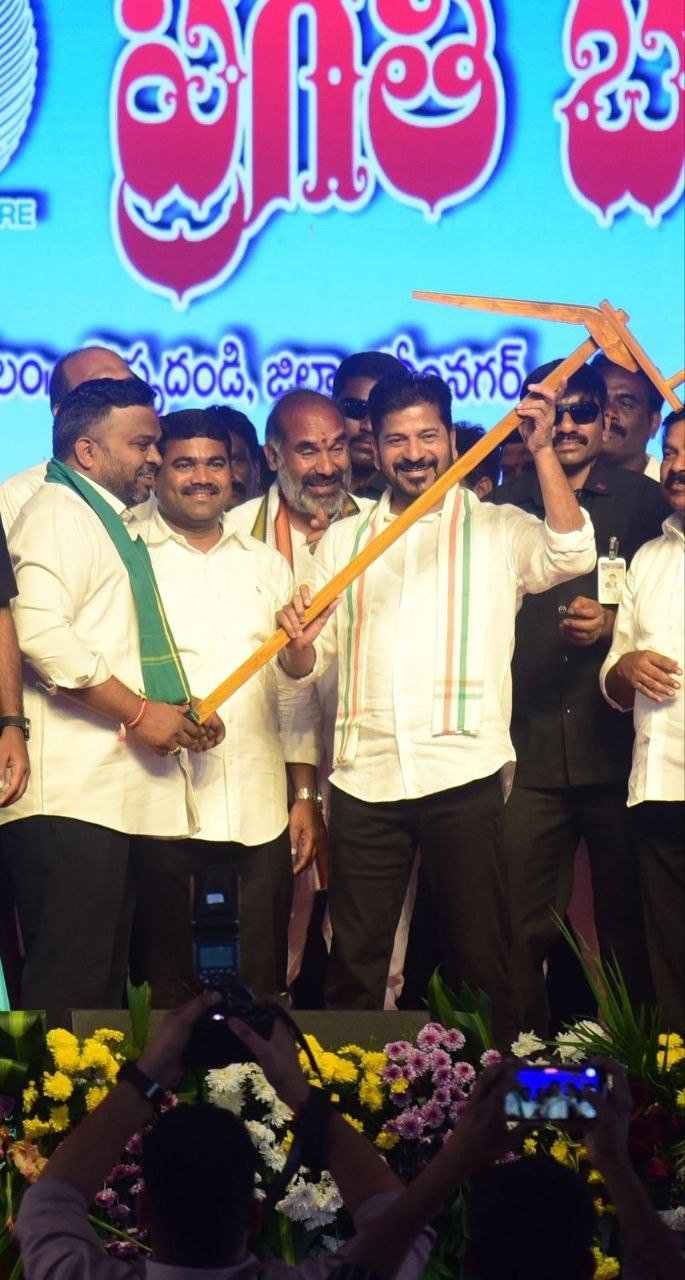 Library Chairman presents plough to Chief Minister