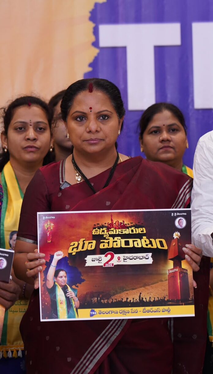 Unveiling of the activists' land struggle poster Kavitha participated